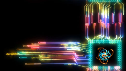 Digital composite image of illuminated lights against black background