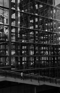 Reflection of building on glass window