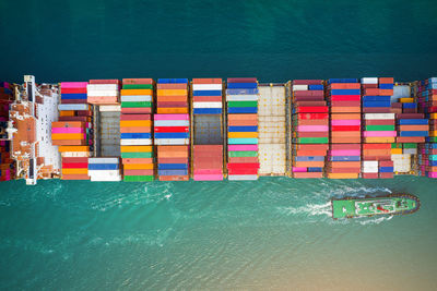 Container ship in export and import business and logistics. aerial view