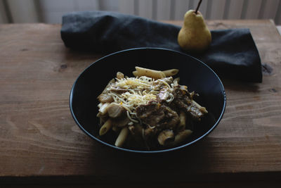 High angle view of pasta in bowl on table