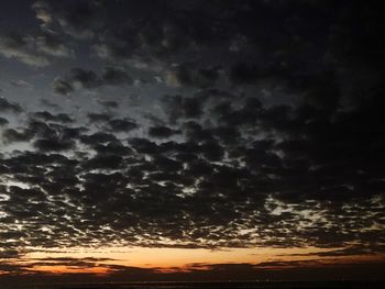 Low angle view of dramatic sky during sunset