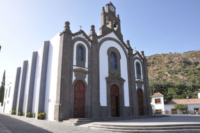 Low angle view of historic building against clear sky