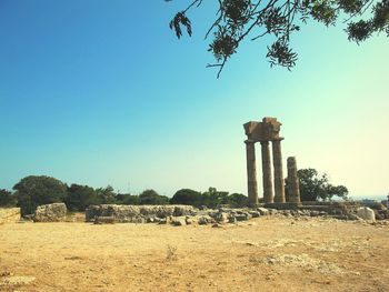 View of old ruin against clear blue sky