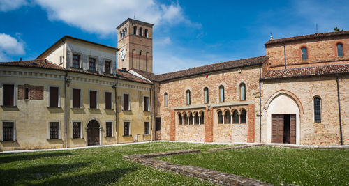 Facade of old building against sky