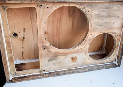 Close-up of window on wooden wall