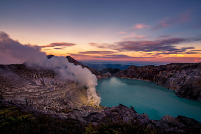 Scenic view of mountains against sky during sunset