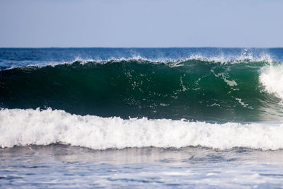 Waves splashing on rocks