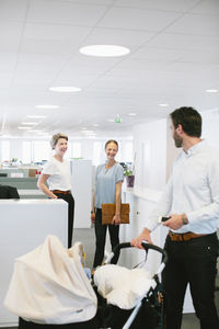 Man with buggy in office