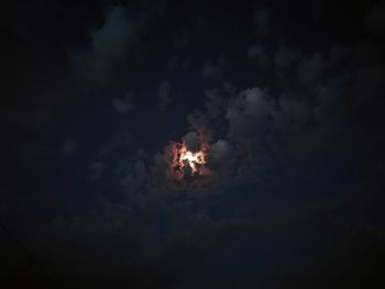Low angle view of fire against sky at night