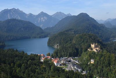 High angle view of townscape by mountains