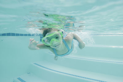 Portrait of girl in swimming pool