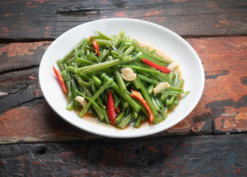 High angle view of salad in bowl on table