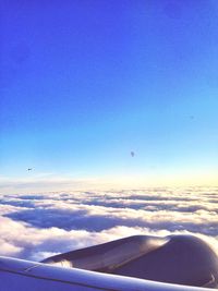 Low angle view of aircraft wing against sky