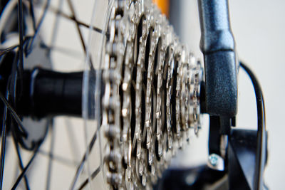 Shifting gears on rear transmission of bicycle. bicycle gear drivetrain and cassette, close up