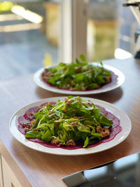 Close-up of salad in plate on table