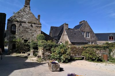 Exterior of old building against blue sky