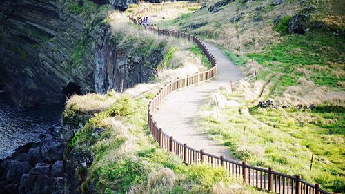 High angle view of walkway on mountain by river