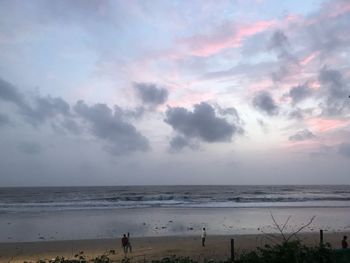 Scenic view of sea against sky at dusk