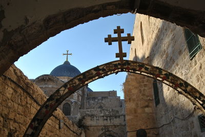 High section of cross on built structure