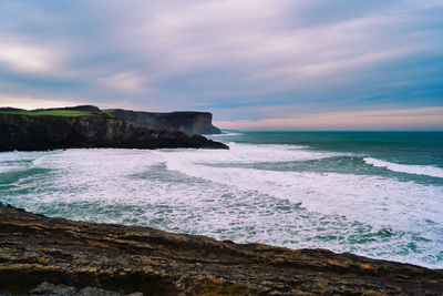 Scenic view of sea against sky during sunset