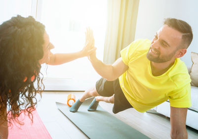 Rear view of people on table