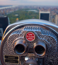 Close-up of coin-operated binoculars at observation point