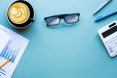 High angle view of coffee cup on table