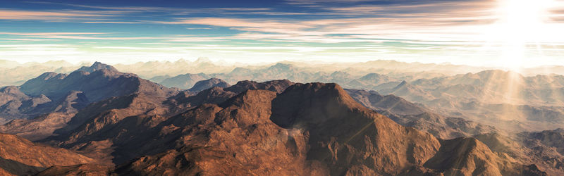 Panoramic view of rock formations against sky