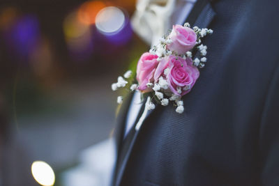 Close-up of pink flower corsage