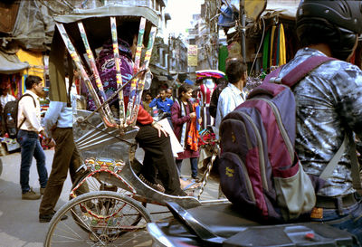 People on street market in city