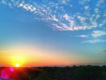 Scenic view of landscape at sunset