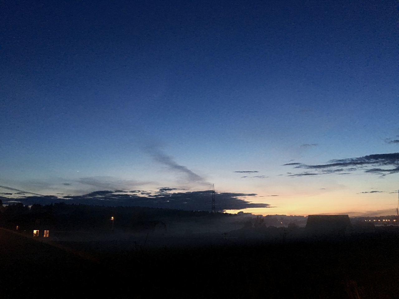 SCENIC VIEW OF SILHOUETTE LANDSCAPE AGAINST BLUE SKY