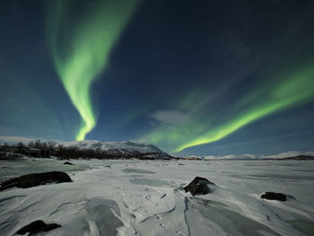 Scenic view of dramatic landscape at night