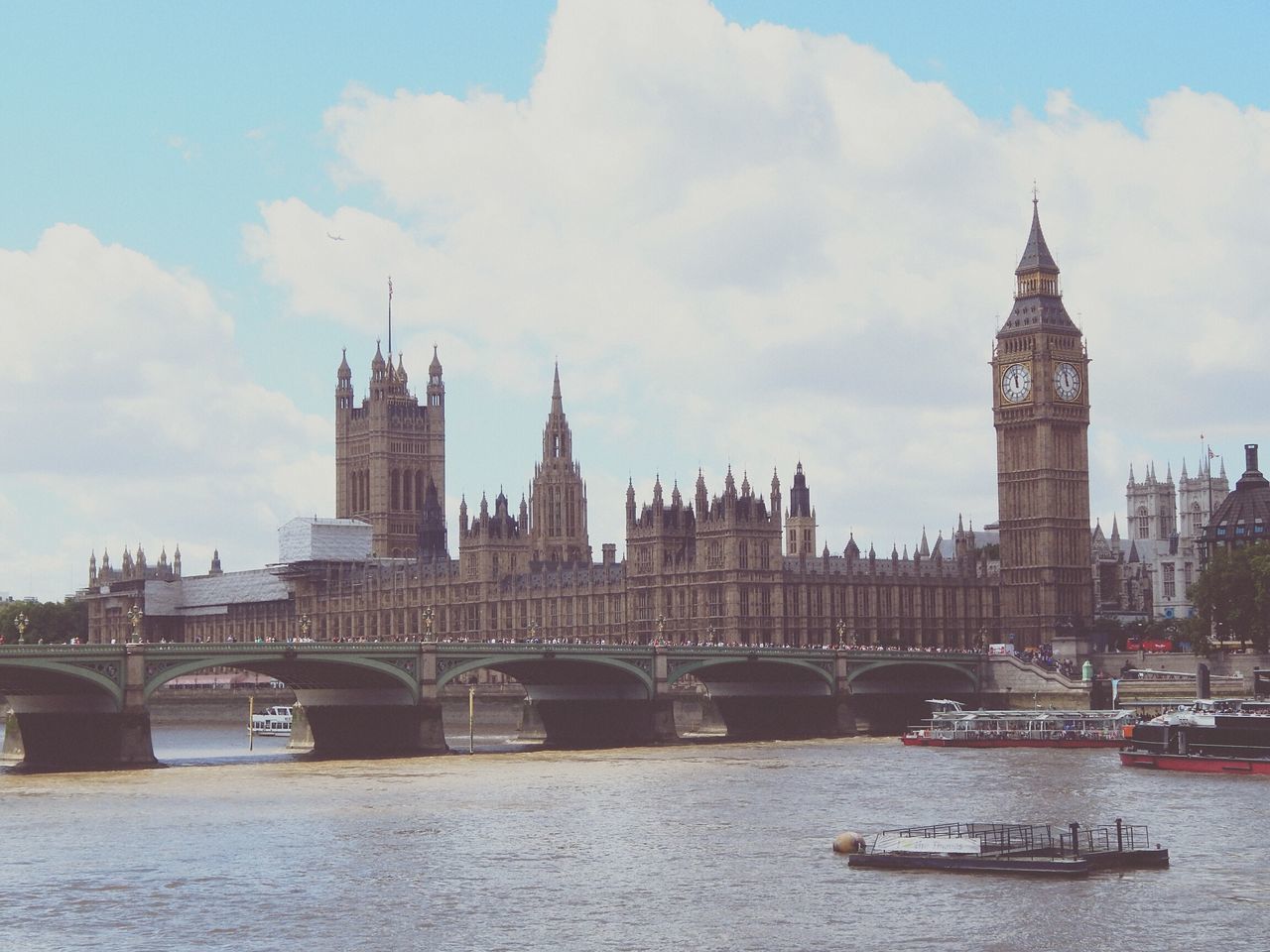 architecture, built structure, sky, river, water, city, connection, famous place, bridge - man made structure, international landmark, travel destinations, capital cities, tourism, cloud - sky, clock tower, thames river, big ben, cloud, canal, culture, outdoors, day, city life, cloudy, no people, tall - high