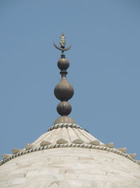 Low angle view of a building against blue sky