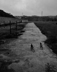 Person walking on dirt road