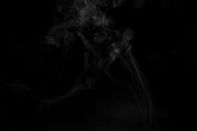 Close-up of smoke against black background