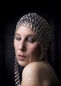 Portrait of woman with metal cap ix