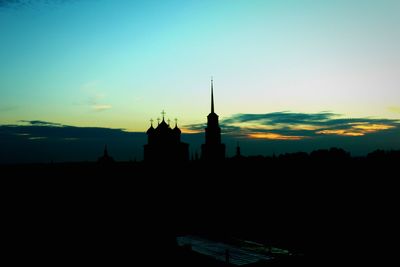 Silhouette of buildings at sunset