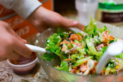 Close-up of hand holding food