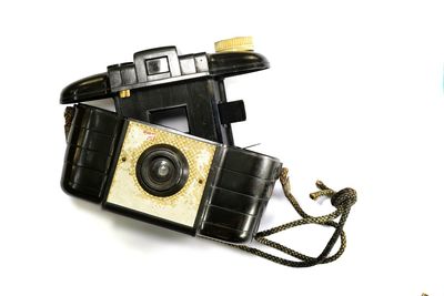 Close-up of camera against white background