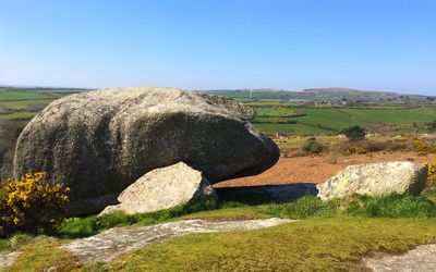 View of landscape against clear blue sky