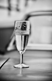 Close-up of wineglass on table