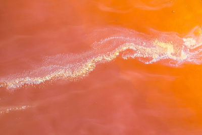 Full frame shot of orange water