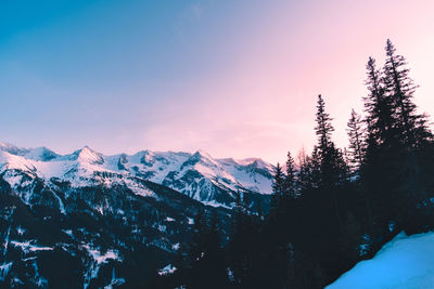 Scenic view of snowcapped mountains against sky during winter