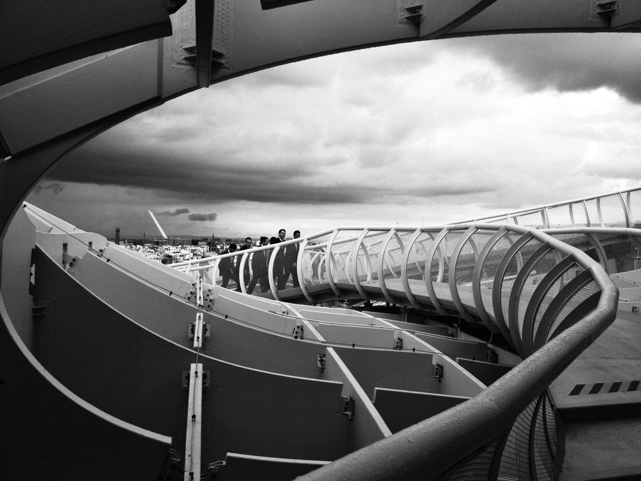 transportation, architecture, built structure, sky, mode of transport, cloud - sky, nautical vessel, metal, low angle view, cloudy, no people, building exterior, day, railing, travel, cloud, airplane, engineering, outdoors, part of