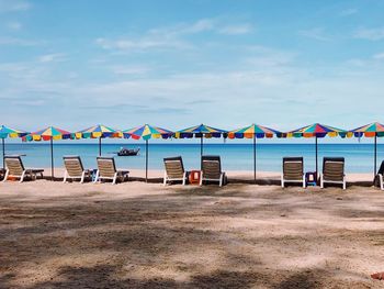 Beach huts against blue sky