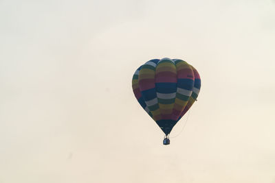 Low angle view of hot air balloon against clear sky