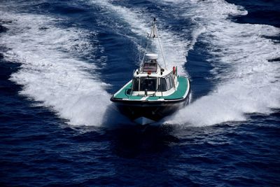 Boat sailing in sea