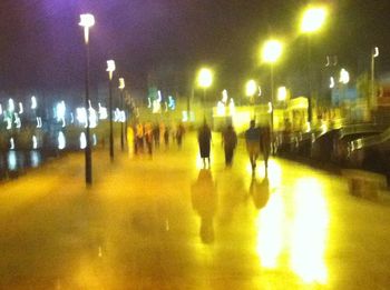 People at illuminated night